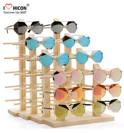 China Equipamento de madeira da propaganda da parte superior contrária de suporte de exposição dos óculos de sol dos clientes surpreendentes fornecedor